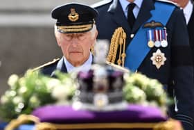 King Charles III walks behind the coffin of Queen Elizabeth II. Photo: Getty