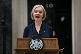 Britain’s Prime Minister Liz Truss delivers a speech outside of 10 Downing Street in central London on October 20, 2022 to announce her resignation.  (Photo by Daniel LEAL / AFP) (Photo by DANIEL LEAL/AFP via Getty Images)