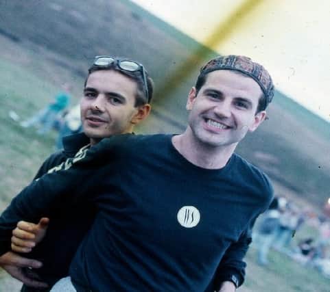 Two ravers at the first outdoor rave up North, The Gio Goi Joy Rave run by Anthony and Chris Donnelly, Ashworth Valley, Rochdale, 5th August 1989.
