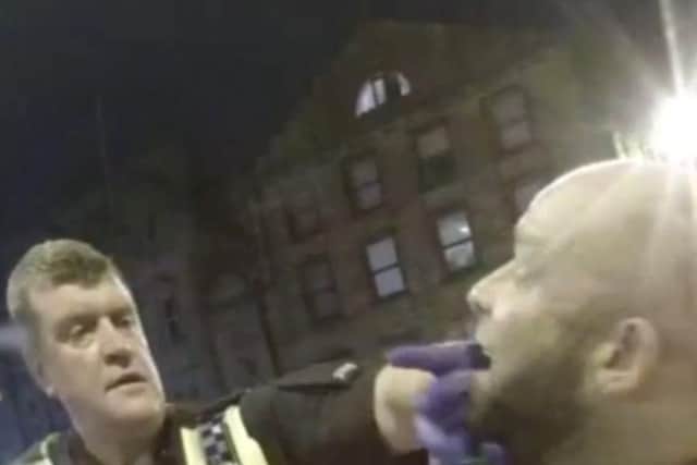 Shocking moment thug from Halifax bites down on officer's finger