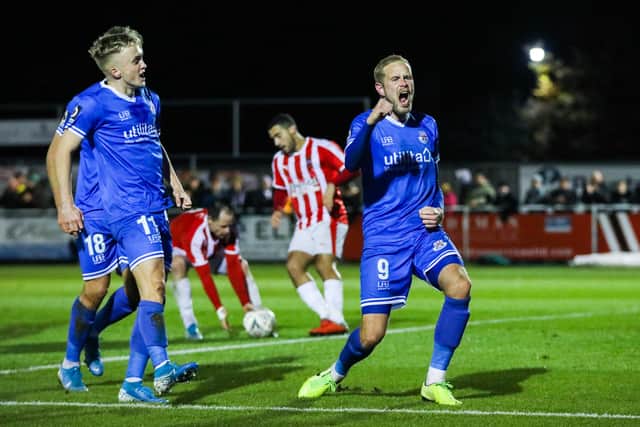EASTLEIGH, ENGLAND - NOVEMBER 19: Scott Rendell of Eastleigh FC celebrates scoring Eastleigh's first goal during the Emirates FA Cup First Round Replay match between Eastleigh FC and Stourbridge FC at the Silverlake Stadium on November 19, 2019 in Eastleigh, England. Photo: Tom Mulholland/Eastleigh FC