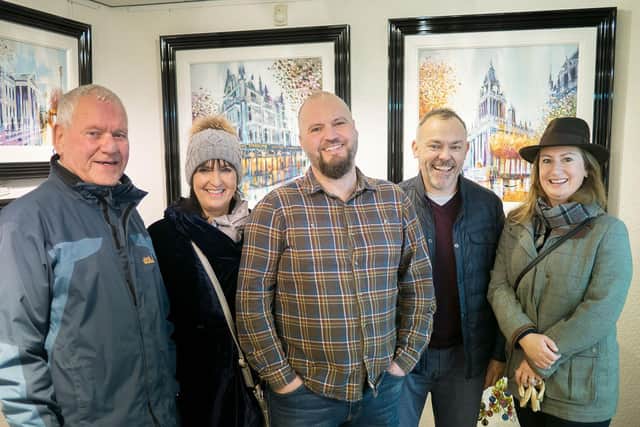 Simon Wright (centre) at the opening of his new exhibition at the Harrison Lord Gallery