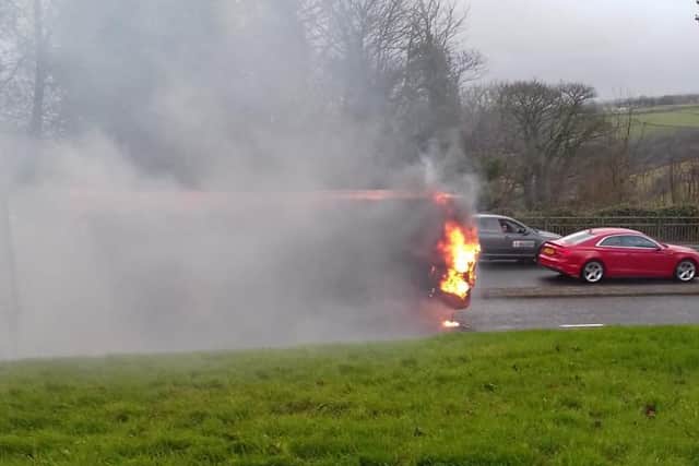 The Yorkshire Tiger bus on fire. (Picture Garry Williams)