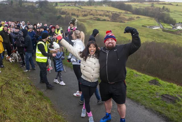 TV personality Jenny Powell and worlds strongest man Eddie Hall tackle the 450 Scammonden Dam steps as Get Fit 4 Mental Wellness celebrate the events 1st year anniversary..