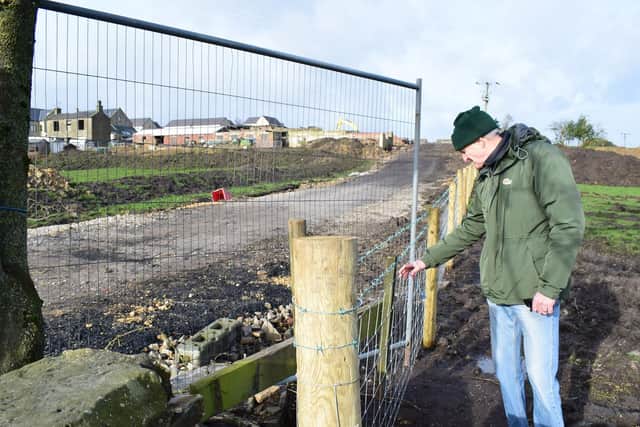 Mr Crossley said the barbwire fence is 'dangerous' for children and other footpath users