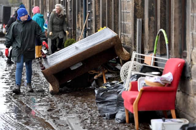 Residents begin clearing up following severe flooding beside the River Calder on February 10, 2020 in Mytholmroyd,  (Photo by Anthony Devlin/Getty Images)