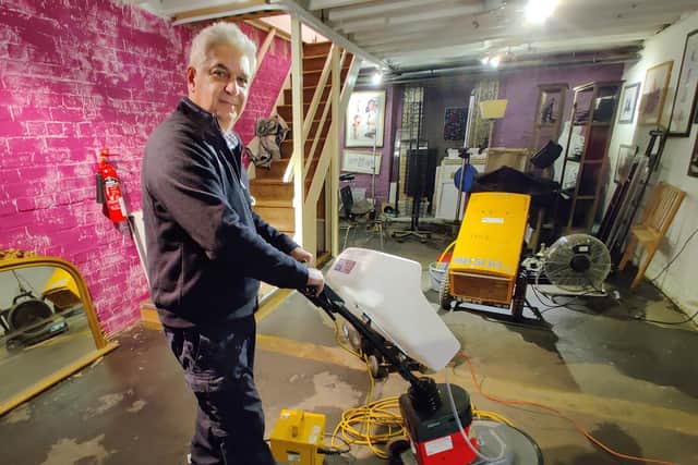 Steven Lord of the Harrison Lord Gallery starts the big clean-up