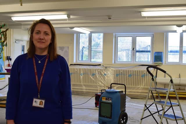 Todmorden CoE headteacher, Alice Leadbitter stood inside one of the damaged classrooms