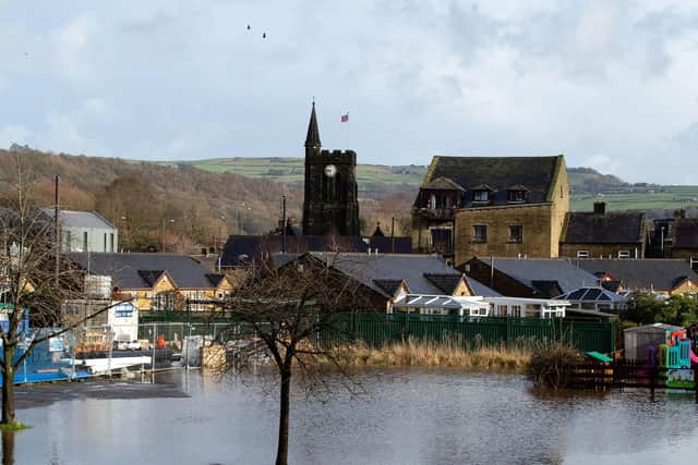 In Mytholmroyd, 500 homes and 400 businesses flooded after the downpour