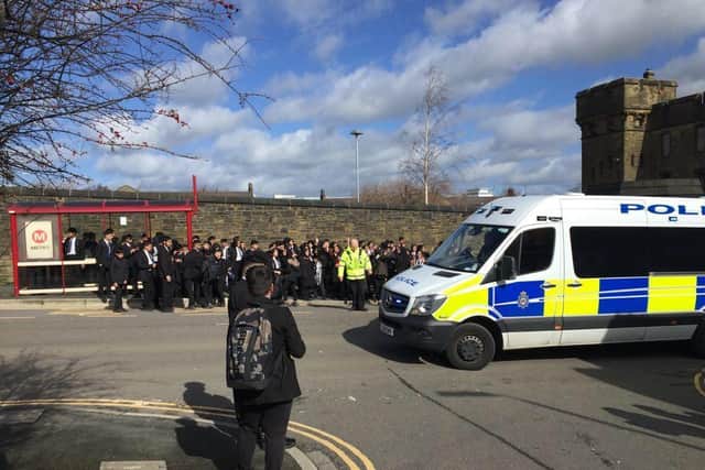 Police arrive at protest at Halifax Academy.