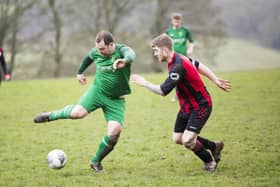 Saturday's game between Sowerby United (green) and Illingworth St Mary's was one of the last to be played in Calderdale for the forseeable future