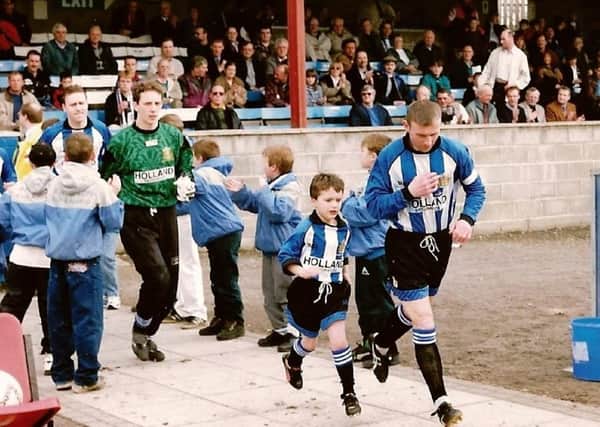 O'Regan leads the team out during the 1995-96 season. Photo: Johnny Meynell