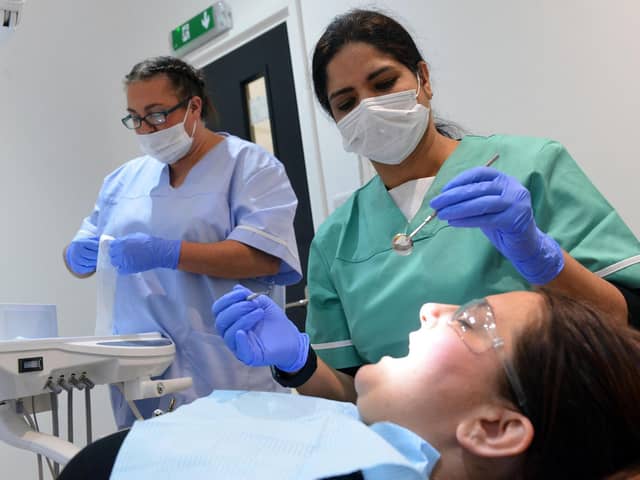 GENERIC: Dentist Kusum Chawla with dental nurse Jayde Williamson inside the new Health and Smile Dental Practice surgery
