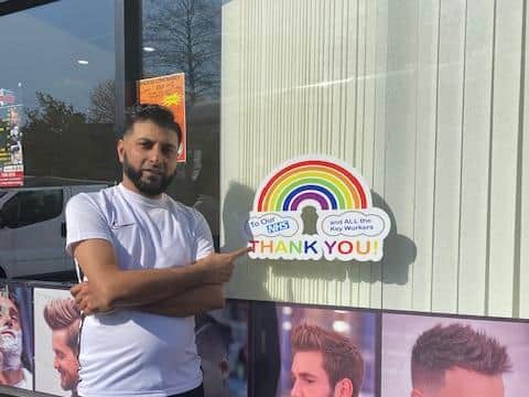 Soahil Ashfaq, also known as Ash, runs Kings Turkish Barbers in Ovenden and has been selling rainbow stickers to raise money for the NHS.