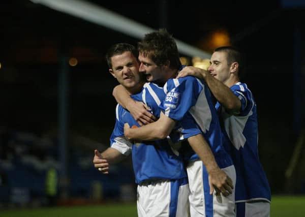 Lewis Killen celebrates a goal for Town against Northwich Victoria at the Shay