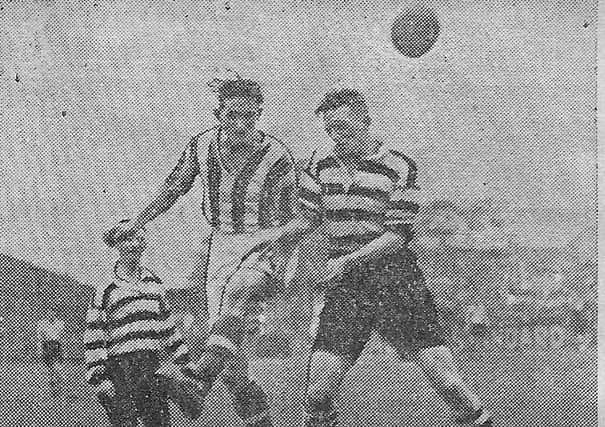 Bernard Massey gets in a header in the match with Darlington at The Shay, 5 October 1946. Photo: Johnny Meynell