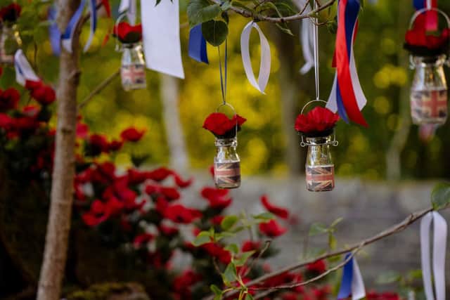 Lynne's apple tree has also been adorned with more than 400 white, blue and red ribbons and 60 Union Jack hanging flower vases.Photo credit: Shelly Mantovani / fstopbrandphotography.co.uk