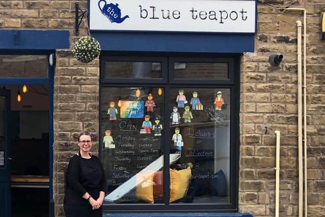Lisa Thwaites stood outside Blue Teapot cafe in Mytholmroyd during Covid-19