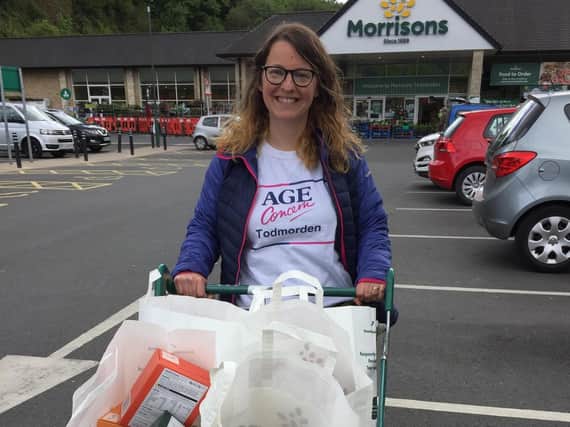 Alexandra Boyle collecting food from Morrisons.