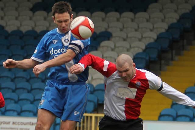 Bower gets his head to the ball at home to Ashton United