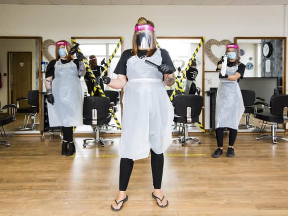 Hair salon Studio 54, Haley Hill, ready to reopen with social distancing and PPE. From the left, Leanne Morton, owner Clare Lumb and Faye Graham. Photo by Jim Fitton.