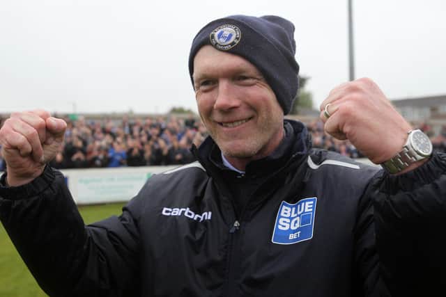 Halifax boss Neil Aspin celebrates the play-off victory at Brackley in 2013