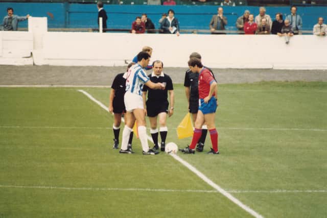 Brown does the formalities before Town's home game with Aldershot in August 1986. Photo: Johnny Meynell