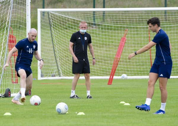 23 June 2020 .....   Halifax Town manager Pete Wild with his players back training for the National League play-offs. Picture Tony Johnson
