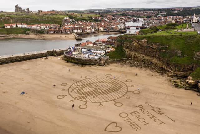 The sand sculpture on the beach at Whitby.