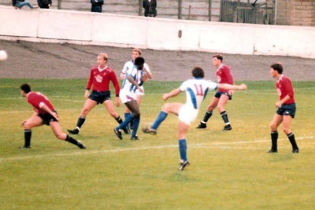 Holden half-volleys a goal at home to Rochdale in August 1987. Photo courtesy of Johnny Meynell