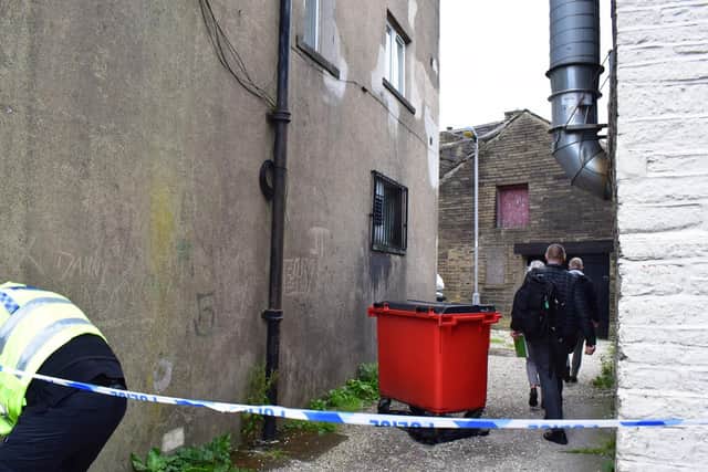 Pictures from scene of Queensbury stabbing that left three seriously injured
