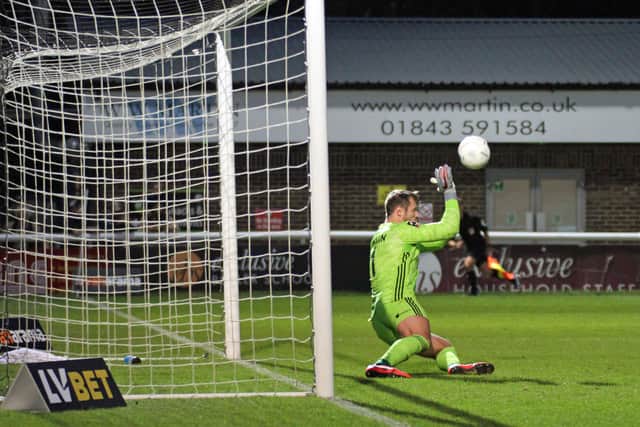 Sam Johnson makes a save during Town's 2-0 win at Dover. Photo: Simon Harris