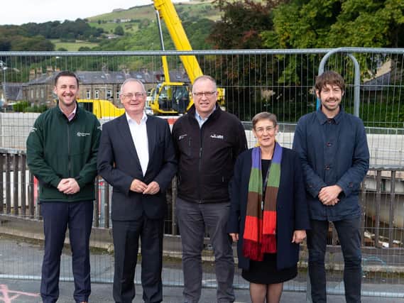 Paul Swales from the Environment Agency, Calderdale Council leader Tim Swift, Chris Blenkarn - main contractor VBA, coun Jane Scullion - deputy leader and coun Scott Patient - representative for Climate Change and the Environment