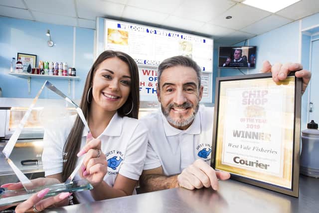 Counter assistant Lydia Horsfall, left, and owner Mark Kosanovic after winning Chip Shop of the Year 2019