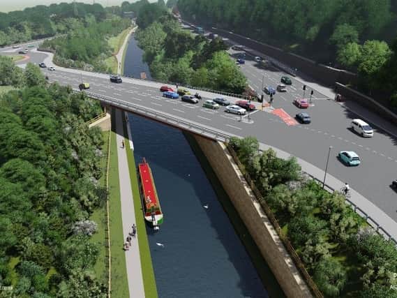 An artists impression of how the completed scheme, with the new bridge over the canal, might look