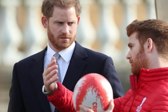 The Duke of Sussex talks with Leeds Rhino player, James Simpson, in the Buckingham Palace gardens, London, as he hosts the Rugby League World Cup 2021 draws. PA Photo. Picture date: Thursday January 16, 2020.  Photo credit: Yui Mok/PA Wire
