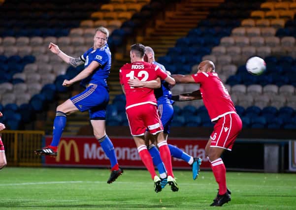 Nathan Clarke in action, FC Halifax Town v Chorley, at The Shay