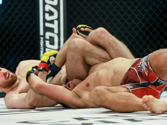 Halifax's George Smith in action against Lucas Marcinkowski in Manchester in March. Photo: Connor Elliot