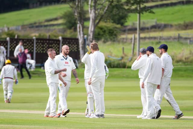 Actions from SBCI v Triangle, cricket at Sowerby Bridge CI. Pictured is Triangle celebrating