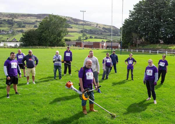 Volunteers come together to help clear up Halifax RUFC, Ovenden Park