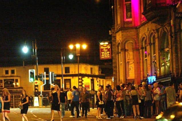 Young people are being targeted by fire service chiefs and the government as the a major factor into the rise of coronavirus cases across the country. Pictured is a night out in Halifax