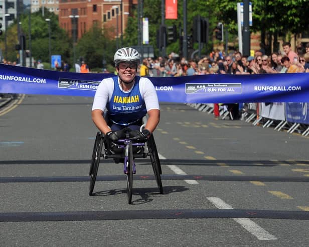 7 July 2019......    Paralympic athlete Hannah Cockroft finishes the  Leeds Run For All.  Picture Tony Johnson.