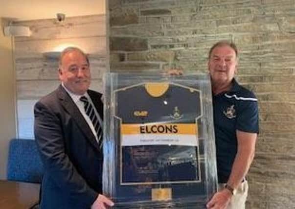 Howard Cooper (Old Crossleyans President) presenting John Peel (Managing Director Elcons) with a shirt from their new kit.