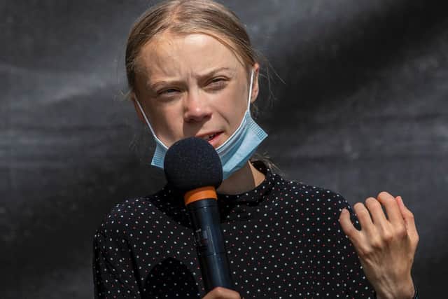 Swedish climate activist Greta Thunberg speaks at a press conference following the meeting with German Chancellor Angela Merkel on August 20, 2020 in Berlin,  (Photo by Maja Hitij/Getty Images)