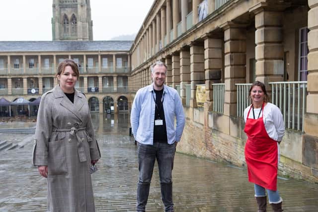 Nicky Thompson-Chance, Andrew Myers and Lisa Cox, helping out children with free meals at The Piece Hall