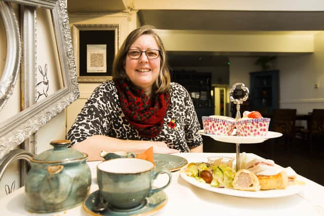 Jo Wilson with takeaway afternoon tea from the Hare and Hounds, Hipperholme.