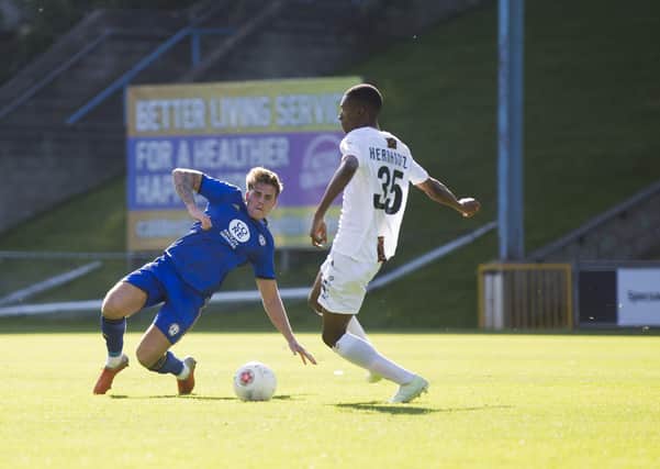 Action from last season's clash between Halifax and Barnet at The Shay