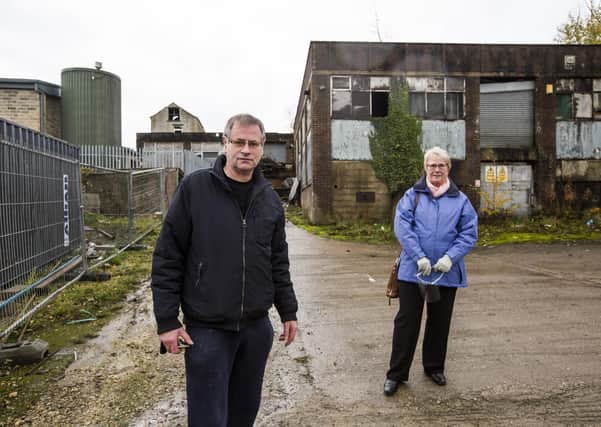 David McCorrie and Margot Wainwright,  concerned about  antisocial behaviour at the derelict Tom Chambers Building, Elland.