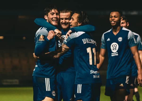 FC Halifax Town players celebrate one of their goals against Barnet on Wednesday. Photo: Marcus Branston