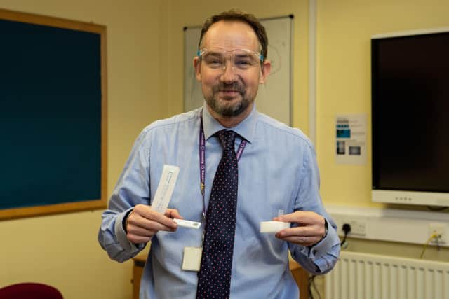 David Lord, head teacher at Ryburn Valley High School, Sowerby, with a Covid testing kit
